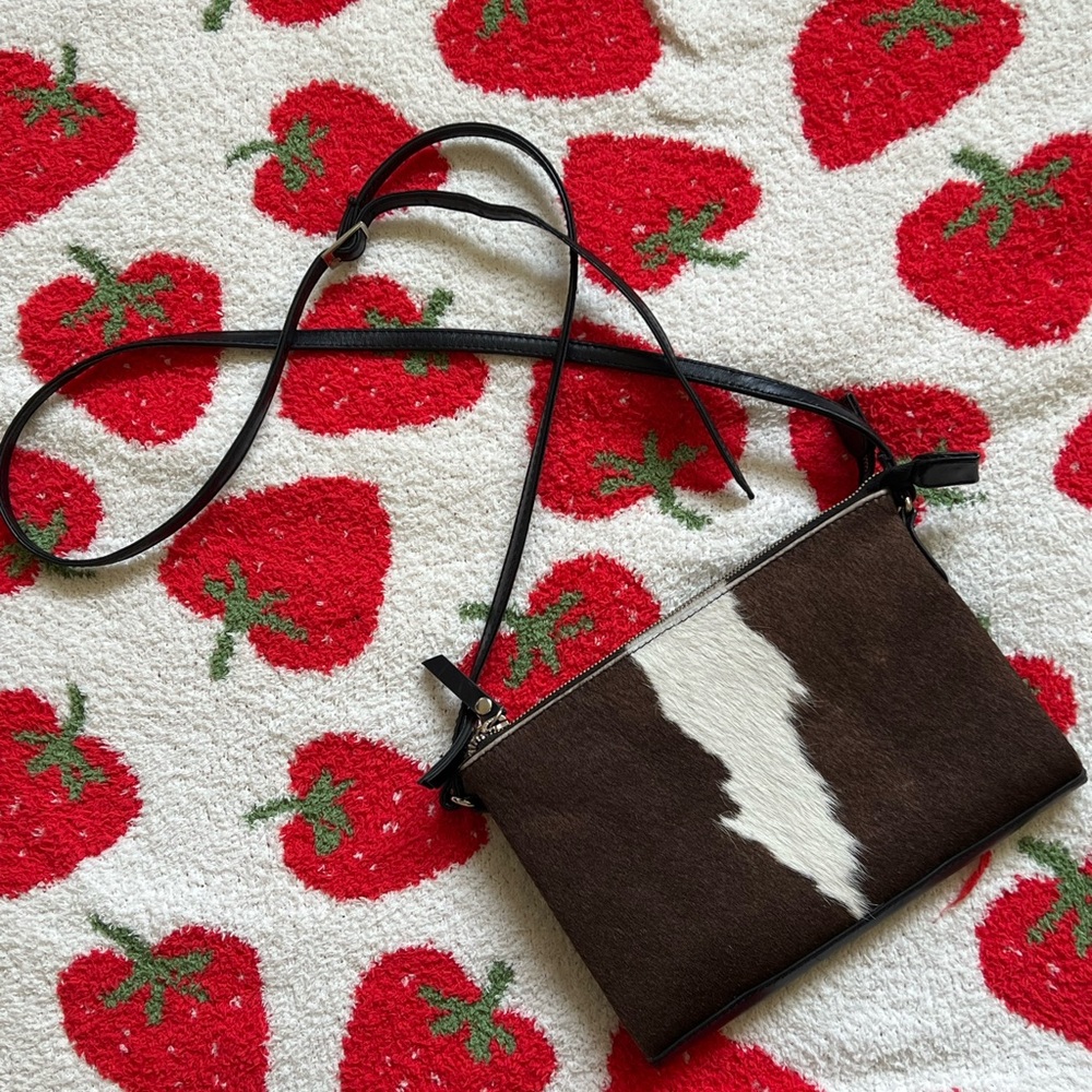 Saudara leather cowhide cross body bag